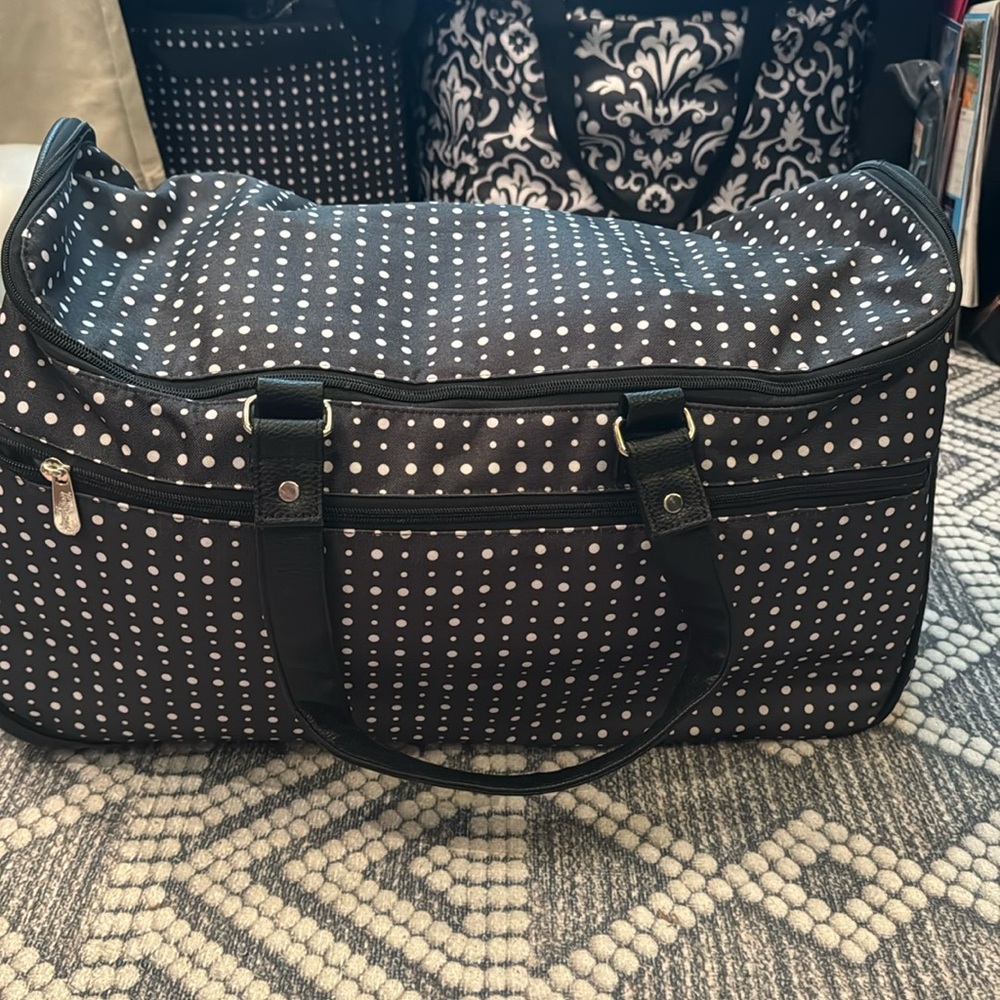 ****SOLD****
BNWOT 31 rolling Traveler bag. Polka dot.